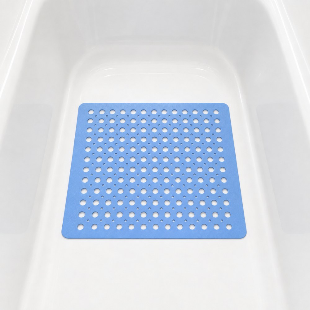 A blue square shower mat sitting in the bottom of a white bath