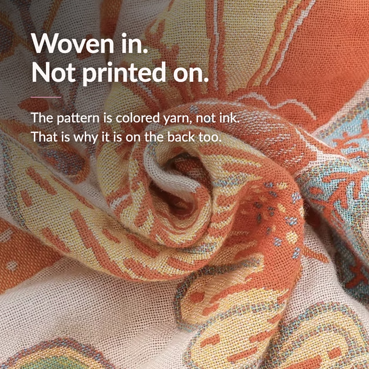 Claim card reading Woven in. Not printed on. Over a close photograph of the cloth rolled at a fold, showing the pattern made of colored threads.